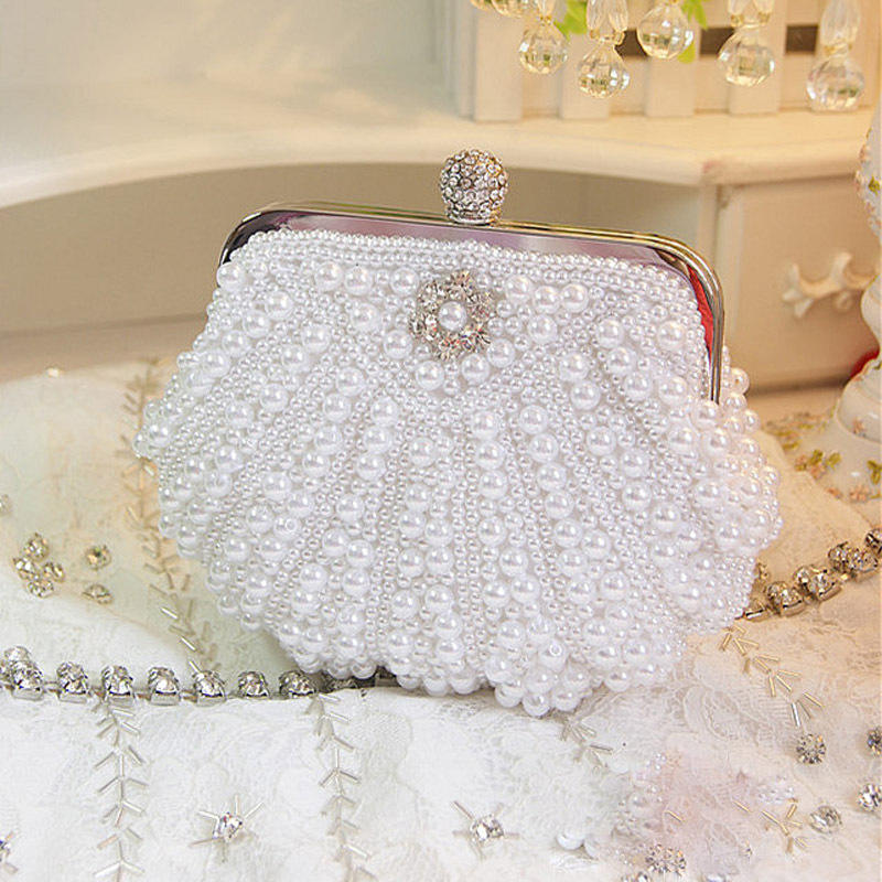 Luxury Scalloped Pearl Clutch  - огляд і ціна Luxury Bags Direct